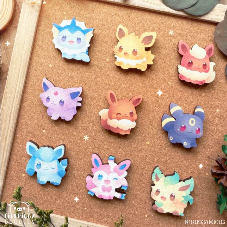 Pin’s en bois Pokémon – Évolutions d’Évoli (Aquali, Voltali, Pyroli, Mentali, Noctali, Phyllali, Givrali, Nymphali) par Firepiggy