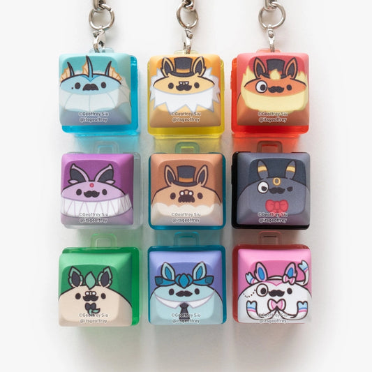 Porte-clés clicker Blind Box Evolitions par Geoffrey Siu