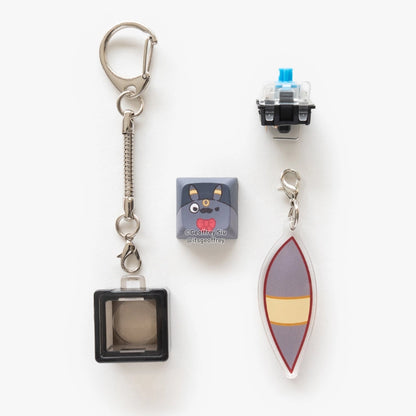 Porte-clés clicker Blind Box Evolitions par Geoffrey Siu