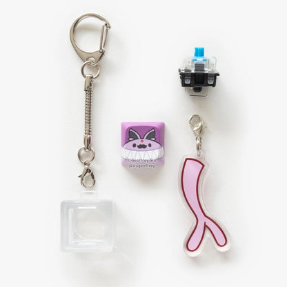 Porte-clés clicker Blind Box Evolitions par Geoffrey Siu