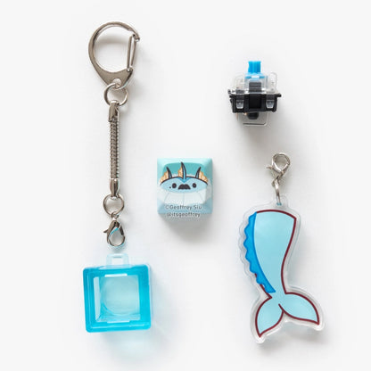 Porte-clés clicker Blind Box Evolitions par Geoffrey Siu